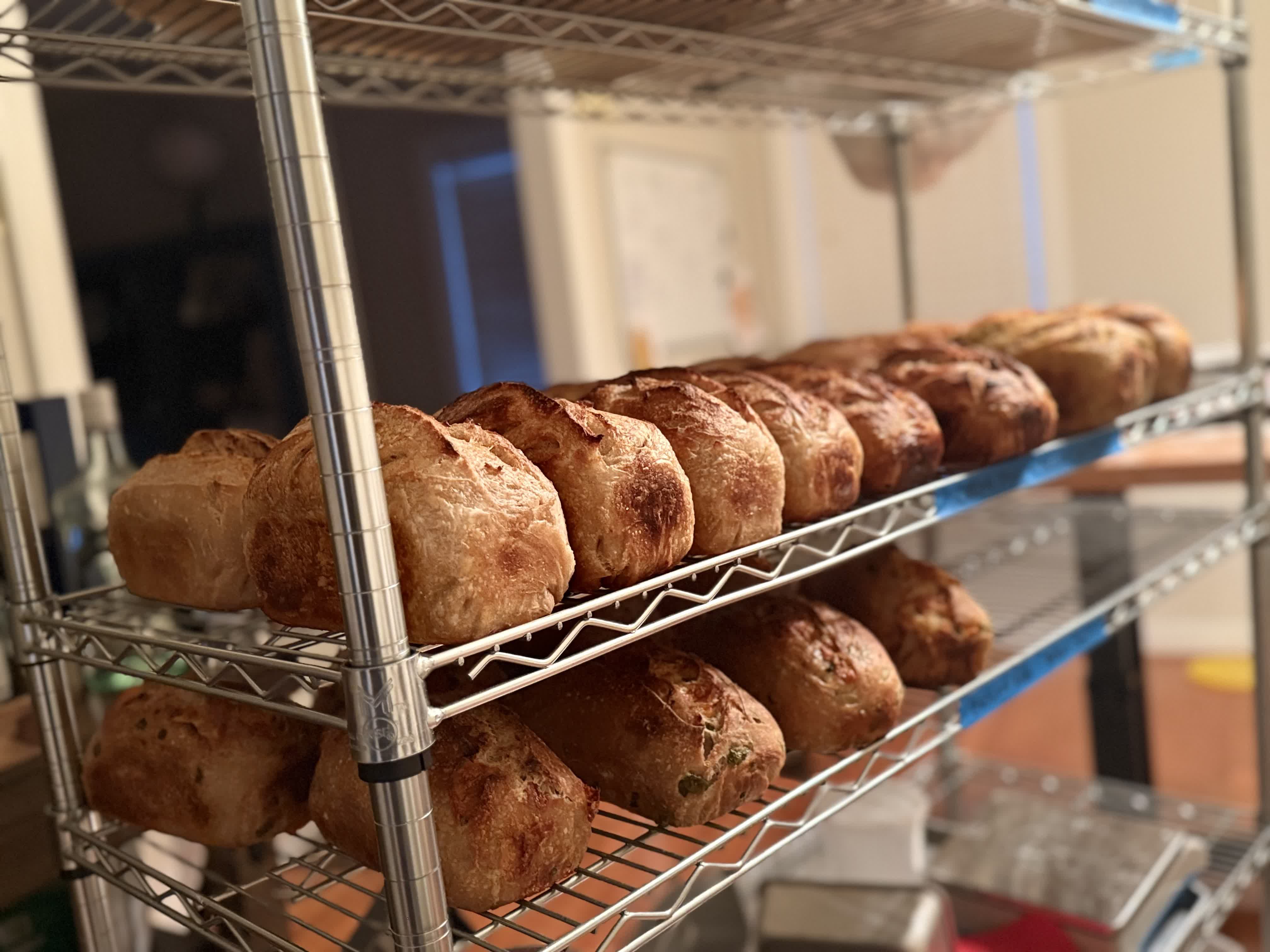 Fresh baked sourdough bread rack at Dat Dad Dough